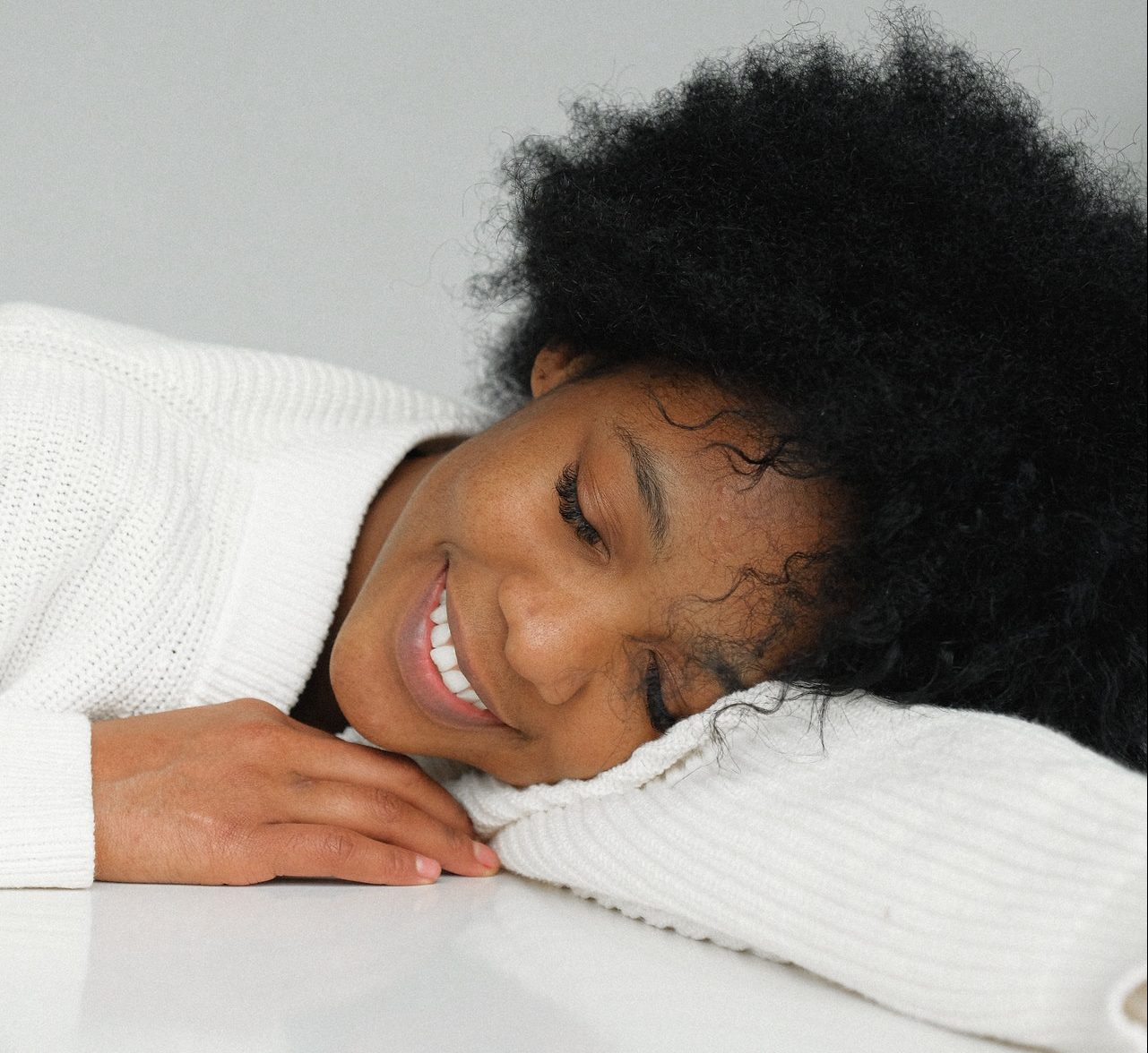 black woman sleep on desk boost energy